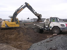 Digger and truck